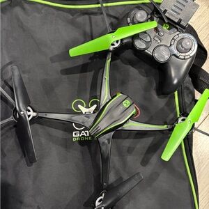 Green and Black Drone with Controller